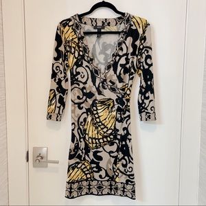 Mint condition, jeweled semi-wrap dress